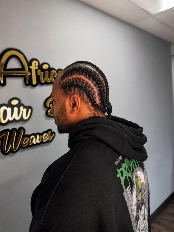 Men's braided style by Mouna Hair Braiding and Weaves