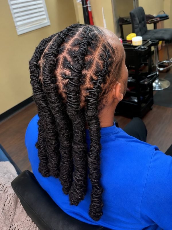 Men's braided style by Mouna Hair Braiding and Weaves