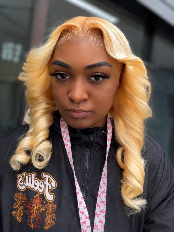 Sew-in weave by Mouna Hair Braiding and Weaves